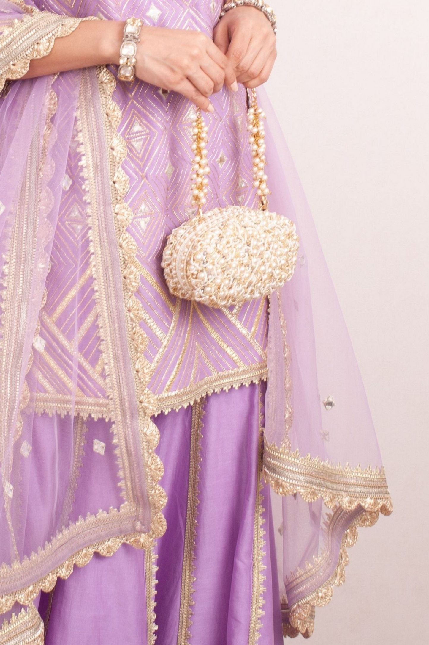 Zuri Oval Clutch