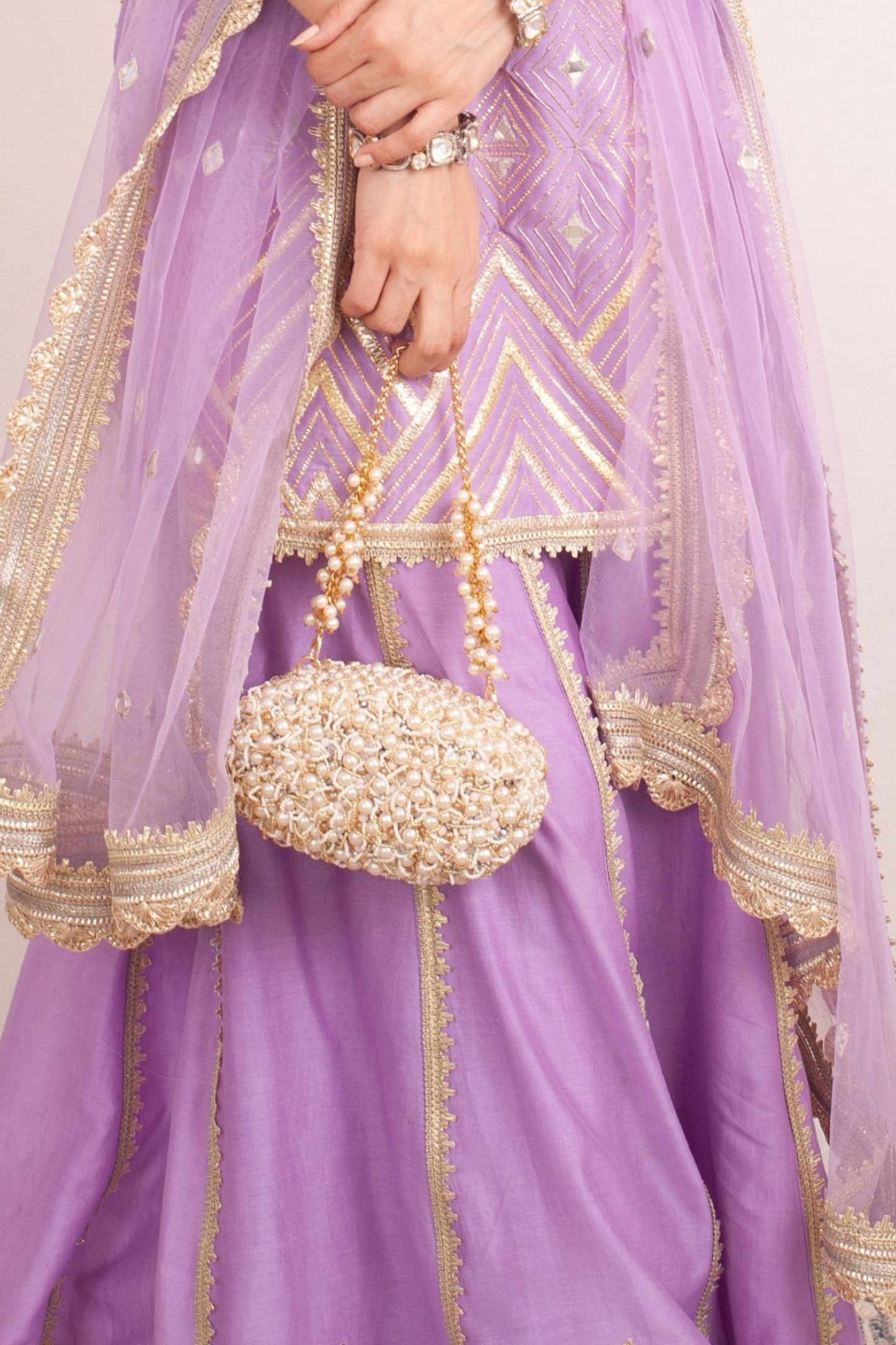 Zuri Oval Clutch